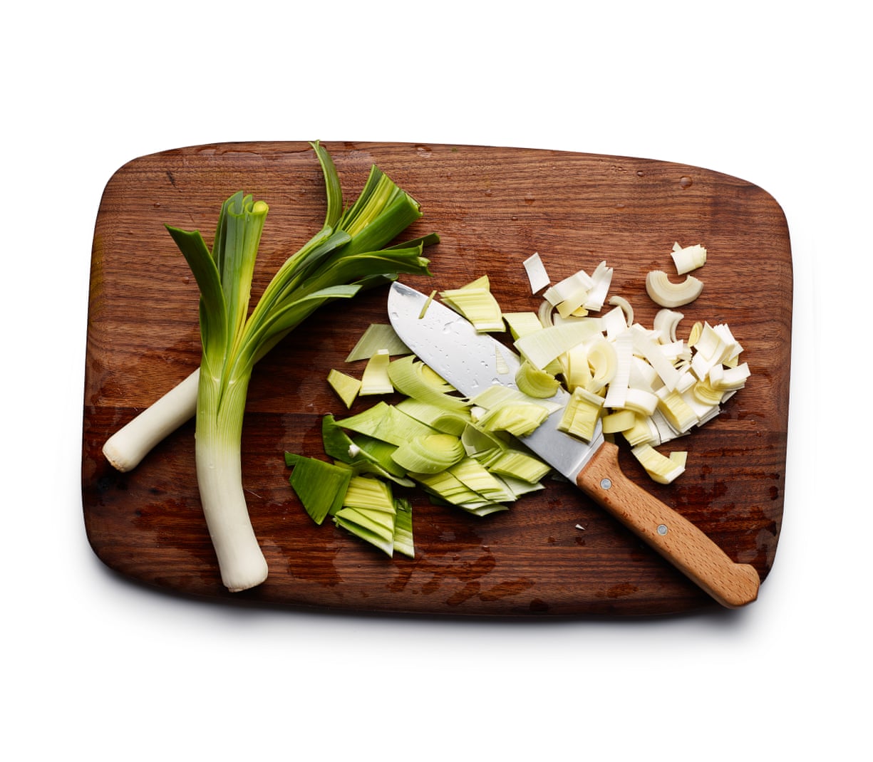  Wash and trim the leeks, then roughly chop; discard only the tops of the leaves, which are very tough.